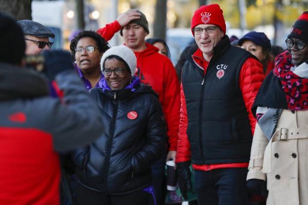 Jesse Sharkey, at right, then Chicago Teachers Unio<em></em>n president, walks with SEIU Local 73 President Dian Palmer, left, after the strikes by both unio<em></em>ns were resolved in 2019. 
